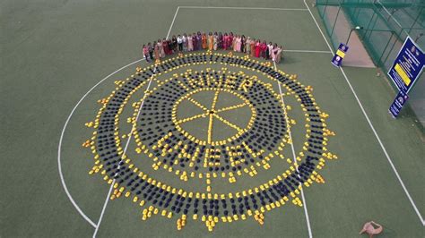 LARGEST INNER WHEEL CLUB LOGO USING COLORING CAPS – World Records India ...