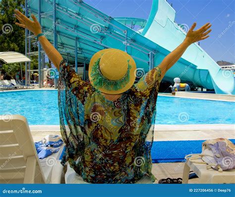 Young Woman In A Hat At The Pool In A Resort Stock Photo Image Of