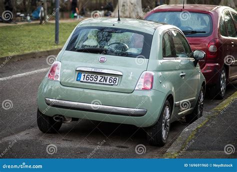 Rear View Of Green Fiat 500 Parked In The Street Editorial Image