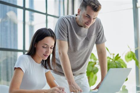 Male Ceo Executive Manager Mentor Giving Consultation On Financial Operations To Female