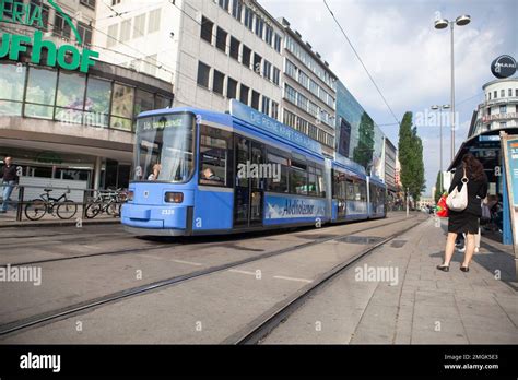 Trams Running Through The City Of Munich Stock Photo Alamy