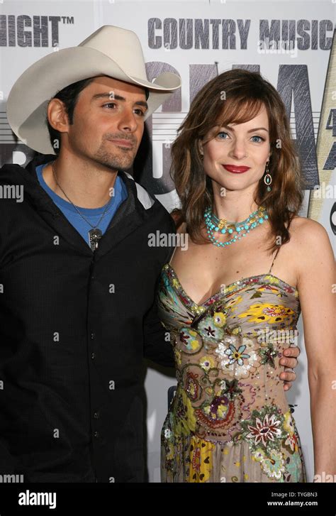 Brad Paisley and his wife Kimberly Williams-Paisley arrive at the 41st ...