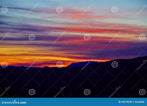 Colorful Sunset and Silhouette of Mountain Landscape Stock Photo ...