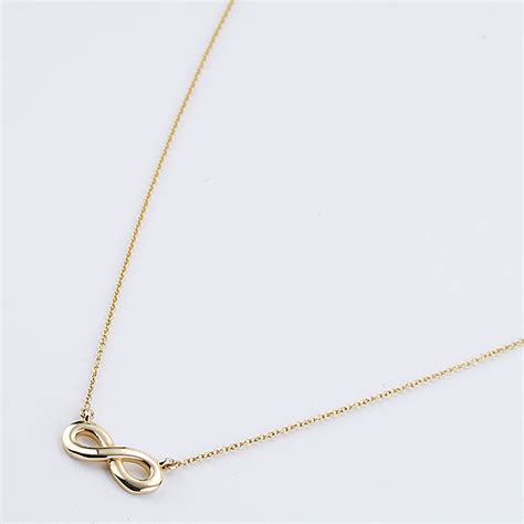 Infinity Symbol Necklace in Yellow Gold | New York Jewelers Chicago