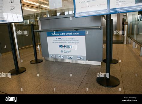 View Of A Us Visit Sign On A Passport Control Booth At Terminal 4 Of Jfk Airport In New York