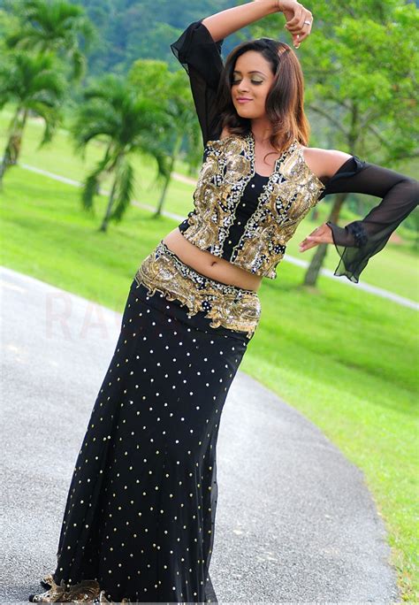 Bhavana Gorgeous Looks In Long Black Skirt Photos