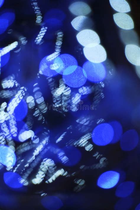 Background Bokeh Blurred Light From Garlands Burning With Blue Light