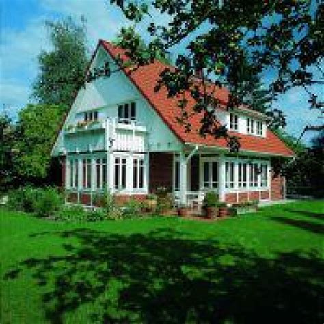 Moderner Fachwerkstil begeistert Landhaus in Rot Weiß ist Haus des