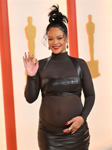 Rihanna shows off baby bump in leather on the Oscars 2023 red carpet