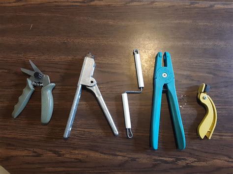 Collection Of 5 Hand Sized Plastic And Metal Tools No Writing Except