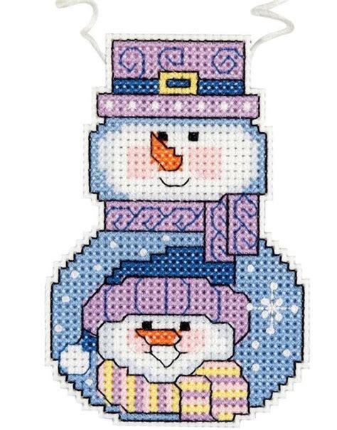 A Cross Stitch Christmas Ornament With Two Snowmen