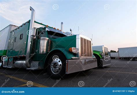 Classic Big Rig Semi Trucks In Line On Truck Stop Stock Image Image