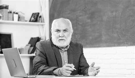 Senior Teacher At School Lesson University Tutor Man At Blackboard College Tutor Mature Tutor