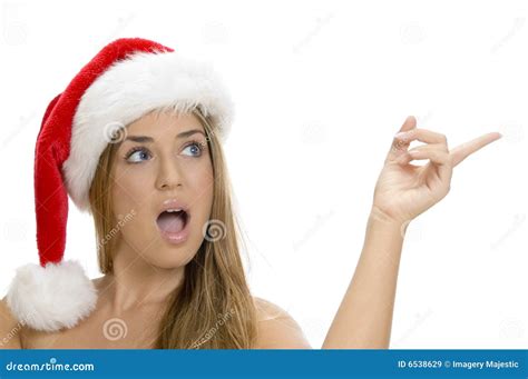 Indicating Lady With Santa Cap Picture Image 6538629