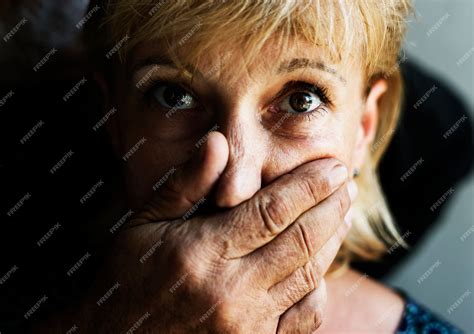 Premium Photo Closeup Of Caucasian Woman With A Hand Covering Her Mouth