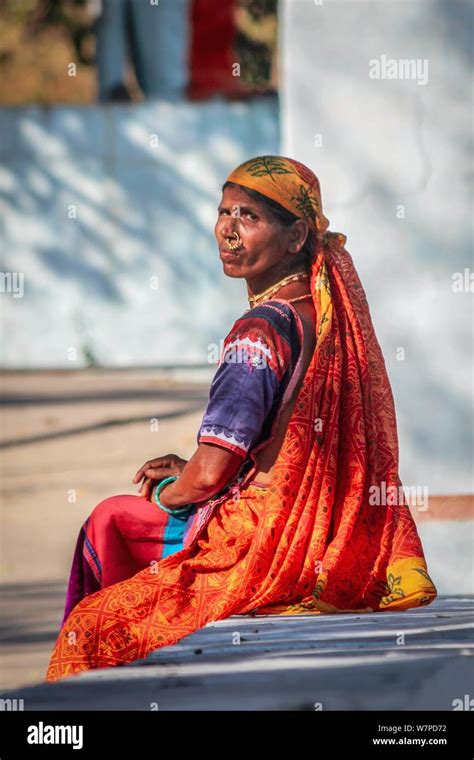 An old woman in traditional clothes at the Hampi Bazaar Street, Hampi ...