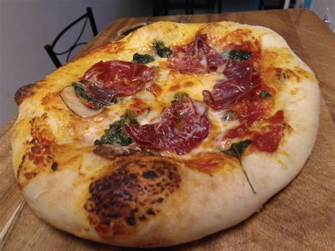 Homemade Cast Iron Pizza With Hot Genoa Salami Mushrooms Basil