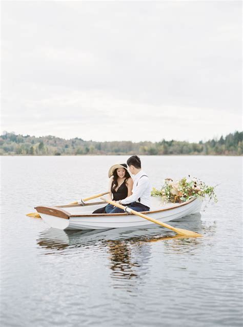 Romantic Engagement Photos Rowboat And Autumnal Flowers Deer Lake Row Boat Engagement Cute