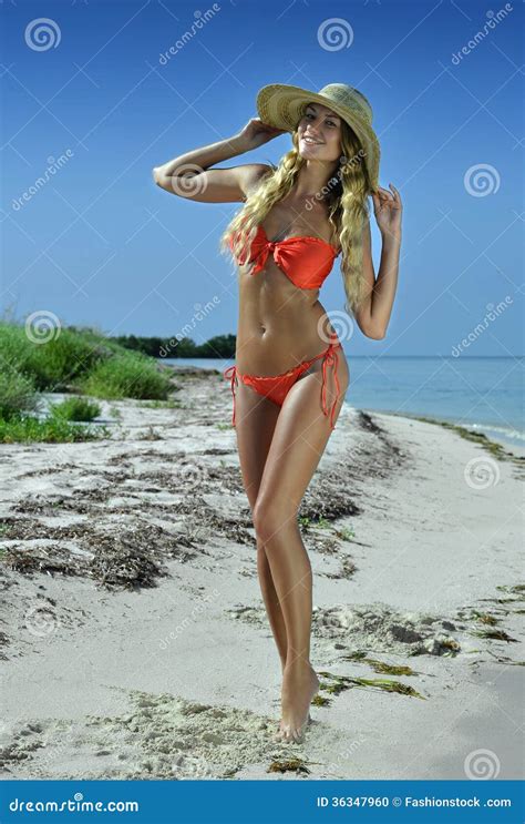 Bikini Model In Straw Hat Posing At Tropical Beach Stock Photo Image