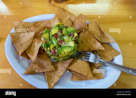 Mexican guacamole and chips Stock Photo - Alamy