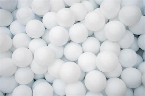 Premium Photo | Many white plastic balls for dry pool