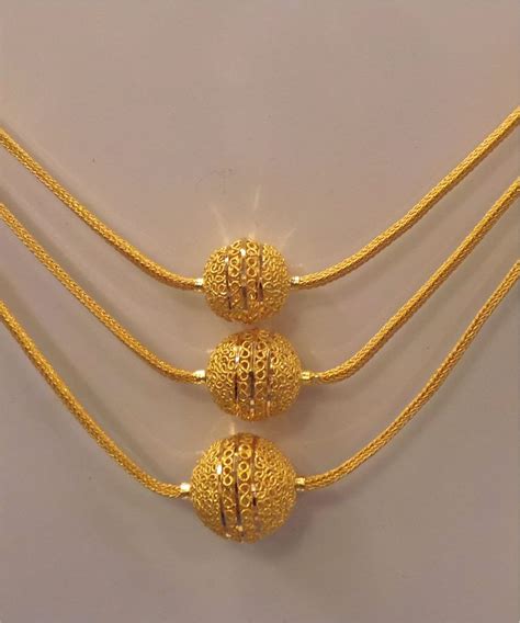 WOMEN'S WORLD: GOLD, PEARL, DIAMOND NECKLACE