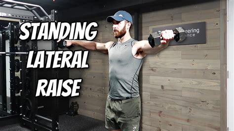 Dumbbell Standing Lateral Raise Exercise Guide & Video