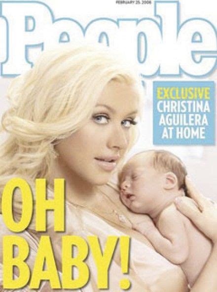 The Cover Of People Magazine Features A Woman Holding A Baby