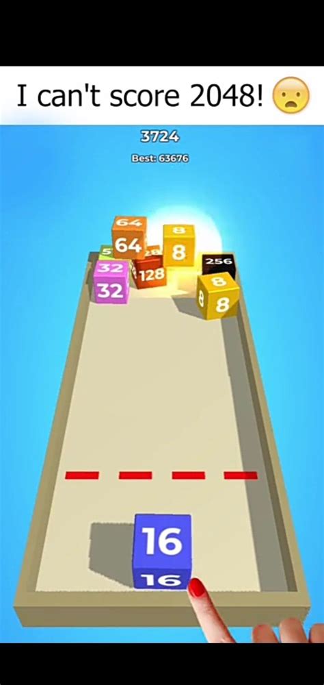 A Hand Is Pointing At An Interactive Game With Blocks And Dices On The