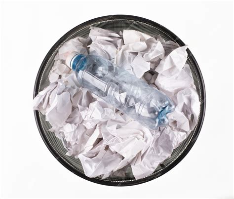 Premium Photo | Office bin with paper trash isolated on white background