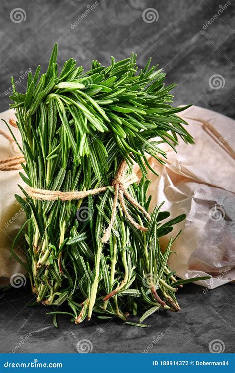 Organic Bouquet Of Fresh Rosemary On A Gray Background A Beautifully