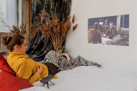 Turn any wall into your personal movie theater with this pocket-sized ...