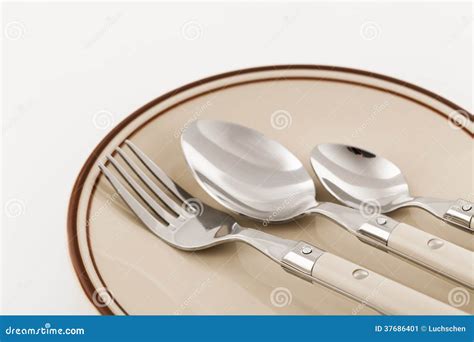 Utensils On A Plate Stock Image Image Of Metal White 37686401