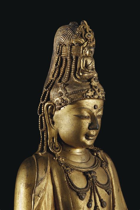 A VERY RARE GILT BRONZE FIGURE OF SEATED GUANYIN 17TH 18TH CENTURY