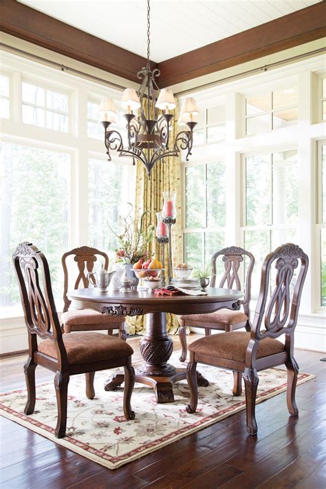 North Shore Round Pedestal Dining Room Set From Ashley D T B