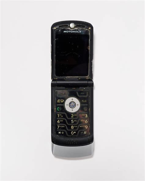 TE117 Motorola Flip Phone Prop Rental - ACME Brooklyn