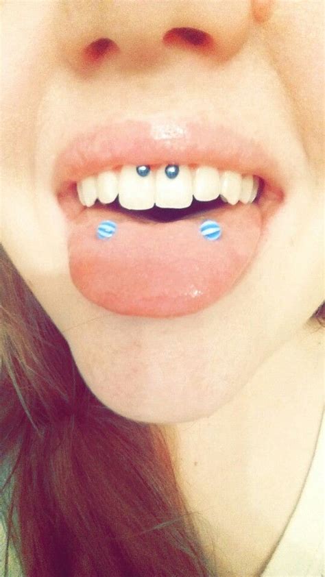 Scoop/surface tongue piercing and smiley piercing!