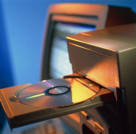 View Of Computer Compact Disc In A Drive Photograph By Tek Image Fine