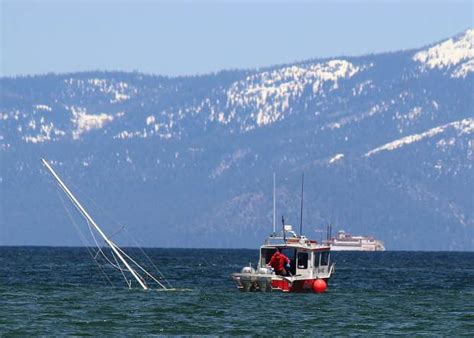 Salvage company works to remove sunken sailboat from Lake Tahoe ...