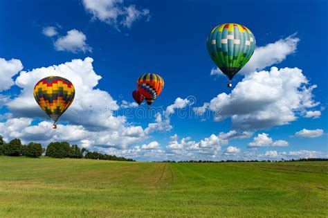 Colorful Hot Air Balloons Over Green Rice Field Stock Image Image Of