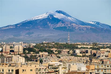 Premium Photo | Aerial view of catania city center rooftops and etna ...