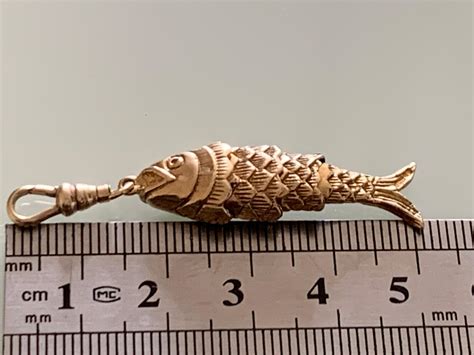 Ct Gold Articulated Fish With Fob Clasp For Sale At Stdibs