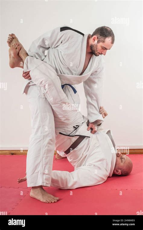 Brazilian Jiu Jitsu Training Demonstration In Traditional Kimono Bjj