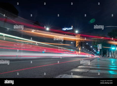 Colosseum At Night Rome Italy With Long Exposure Lights Fast Moving