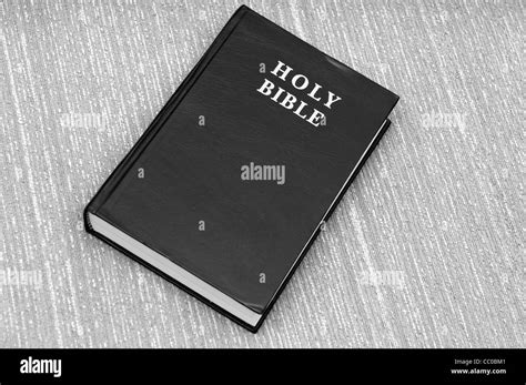 An Old Bible Isolated On Red Textured Background Stock Photo Alamy