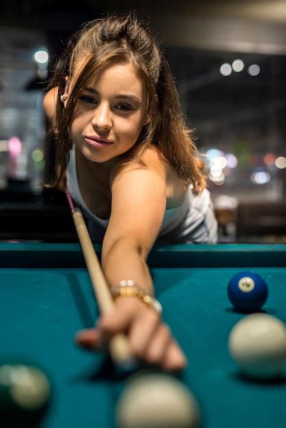 Premium Photo Attractive Woman Hold Cue And Playing Billiards