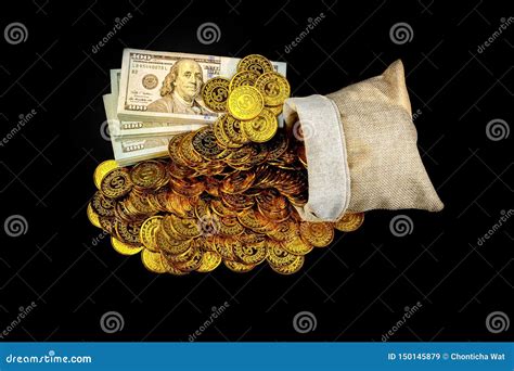 Stack Bundles Of 100 Us Dollars Banknotes And Gold Coin In Treasure Sack On Black Background