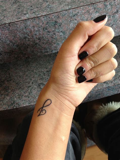 J Tattoo On Finger