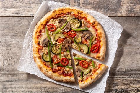 Premium Photo Vegetarian Pizza With Zucchini Tomato Peppers And