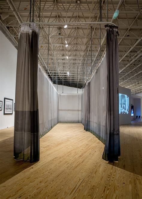 walls turned sideways artists confront  justice system